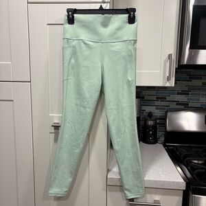Athleta Salutation Stash Tight mint green